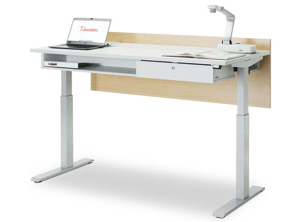 inobjekt media desk ino.desk in use with notebook, document camera and book. Closed flaps of the storage compartments for media technology.