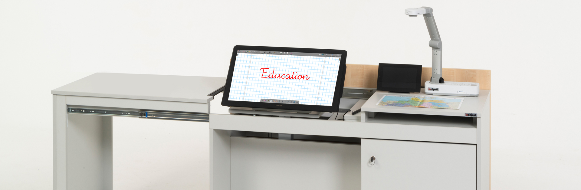 Header: Teacher's desk ino.teach II with interactive display DTH-2452, media control, document camera and book