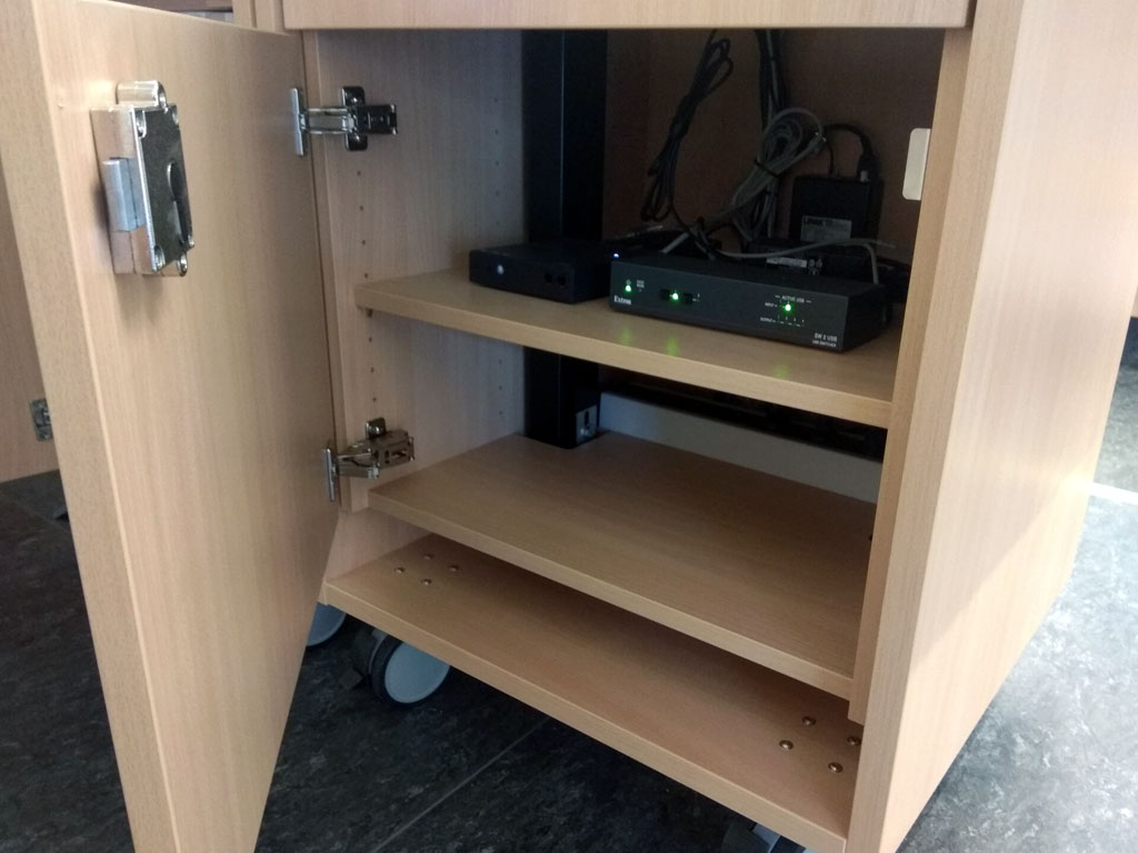 Detailed view: Opened technical cabinet in the teach.maga lectern